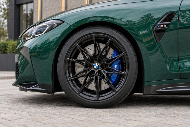 BMW M4 Competition xDrive — front wheel and blue brake caliper