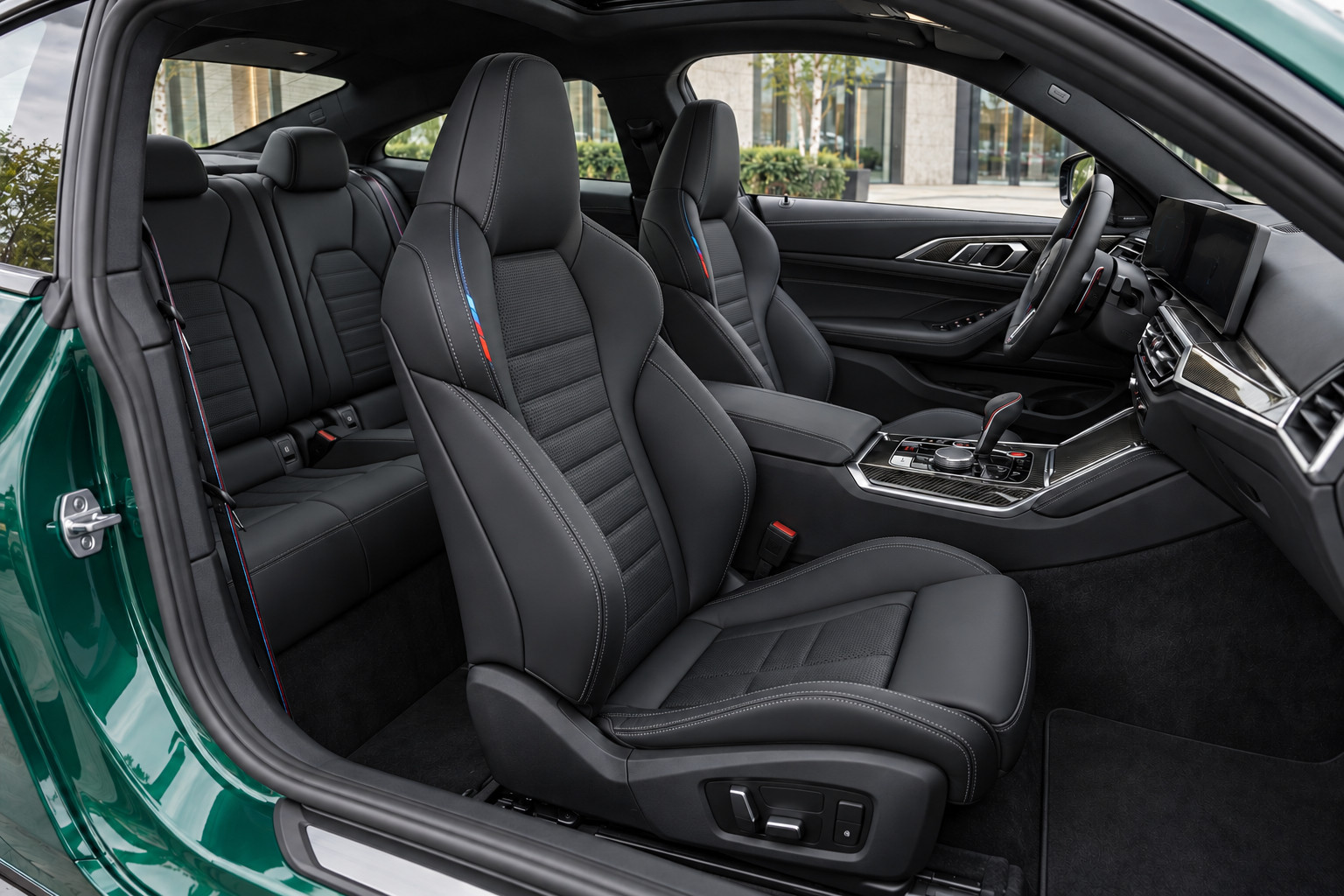 BMW M4 Competition xDrive — front seats
