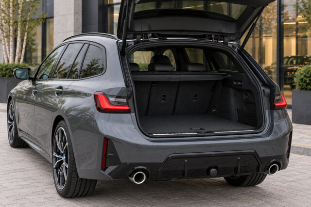 BMW 330e Touring — luggage area with tailgate open