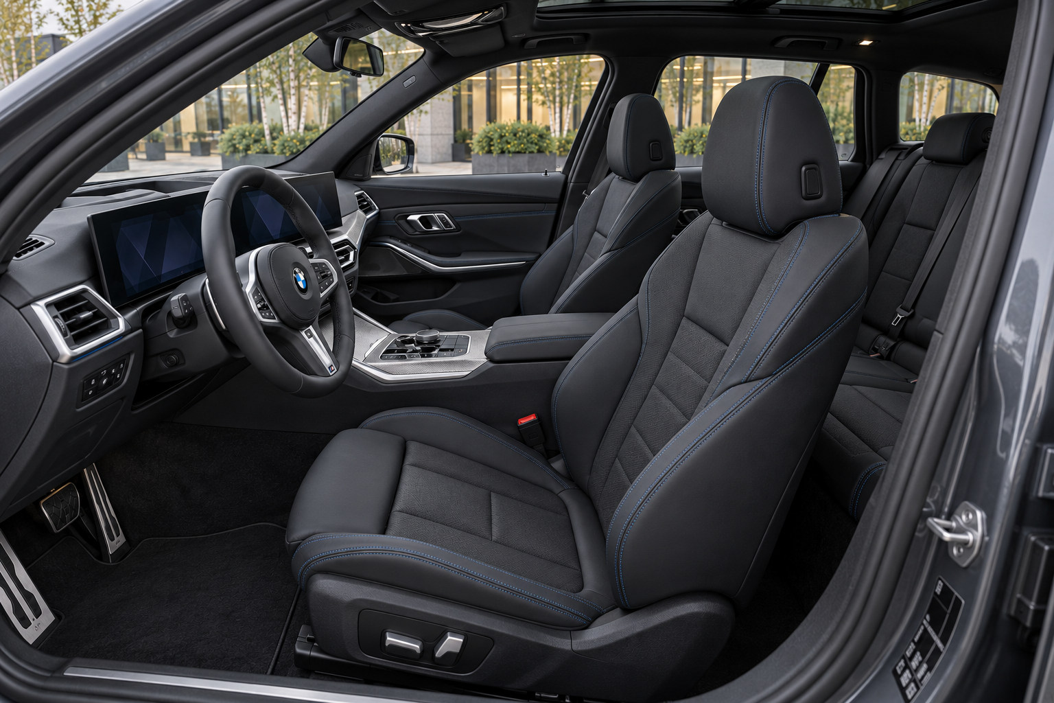 BMW 330e Touring — front seats