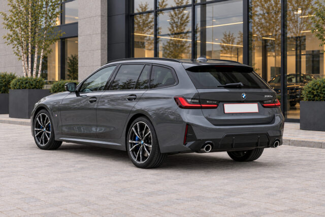 BMW 330e Touring — rear three-quarter view