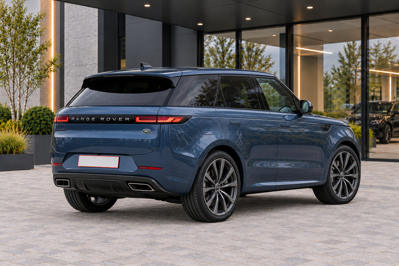 Range Rover Sport P440e — rear three-quarter view